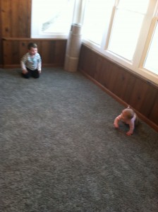 Porch- kids enjoy the new carpet