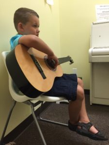 aidan-listen-guitar